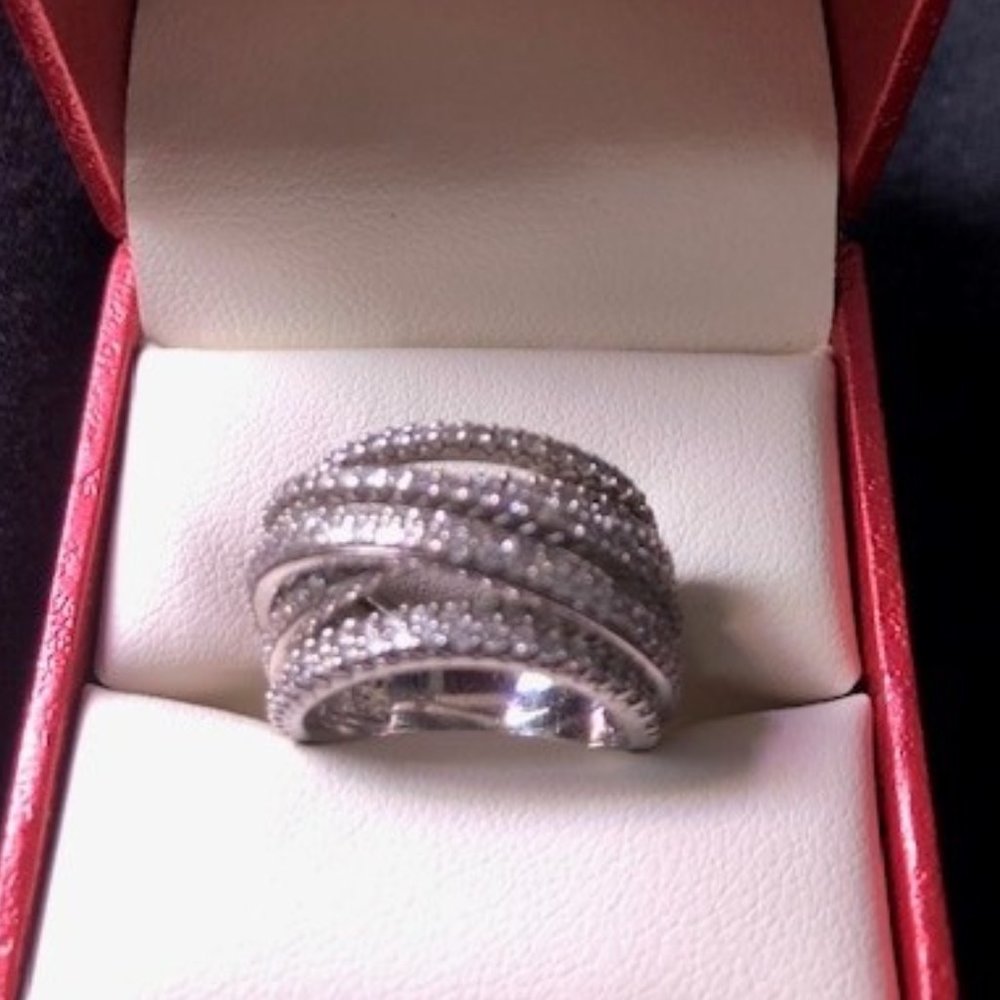 Lavish Rhodium Plated Sterling Silver Intertwined Design CZ 13.5